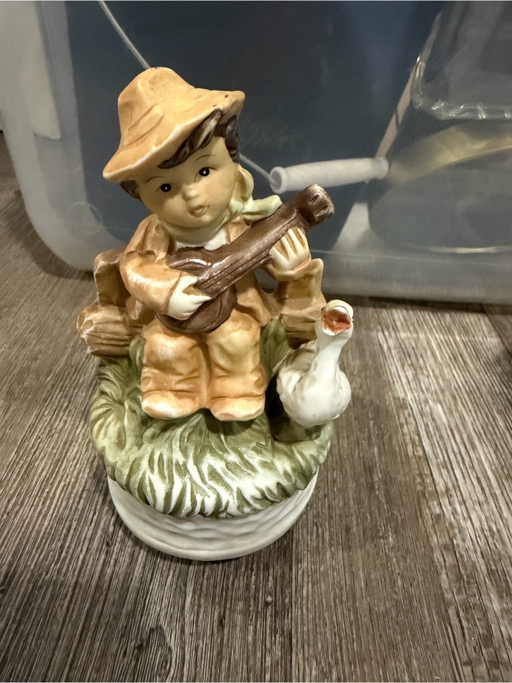 Porcelain Boy Figurine with Goose - Tan, Green, Brown